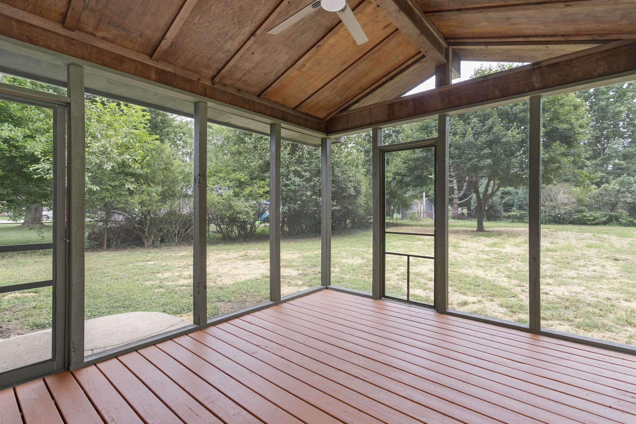 After: Screened-in porch with new decking — 15278 Montecito Granger