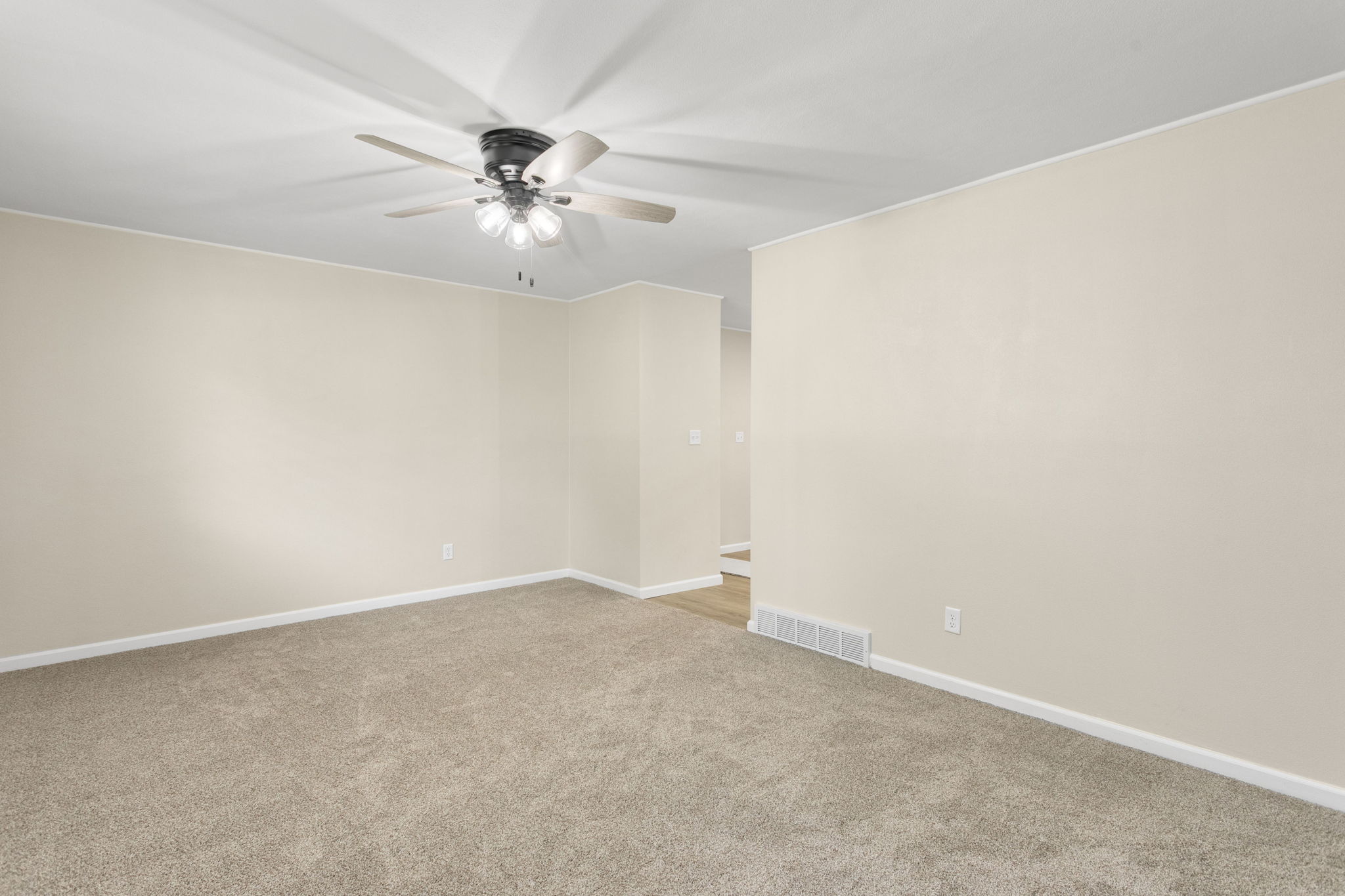 After: Renovated primary bedroom with new carpet — 15278 Montecito Granger