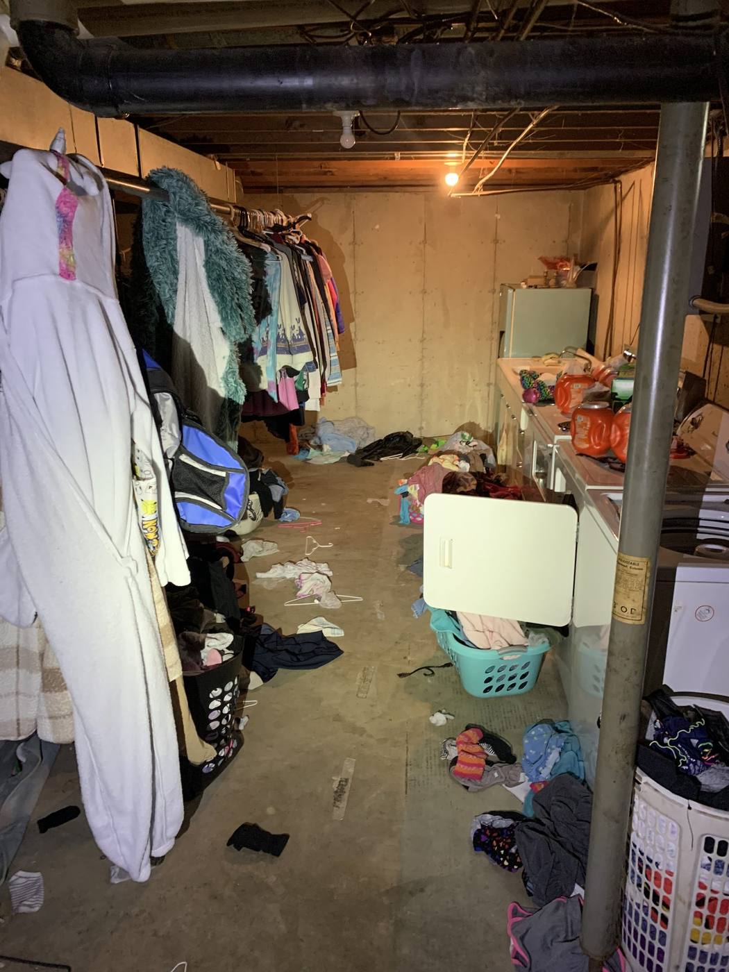Before: Basement loaded with accumulated contents — 15278 Montecito Granger