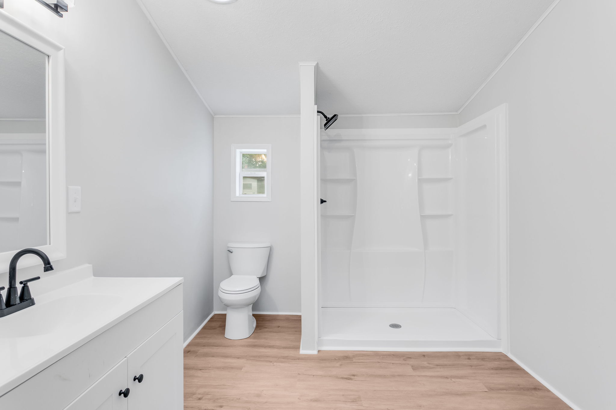 After: Fully renovated bathroom with new vanity and walk-in shower — 2715 Ewing Mishawaka