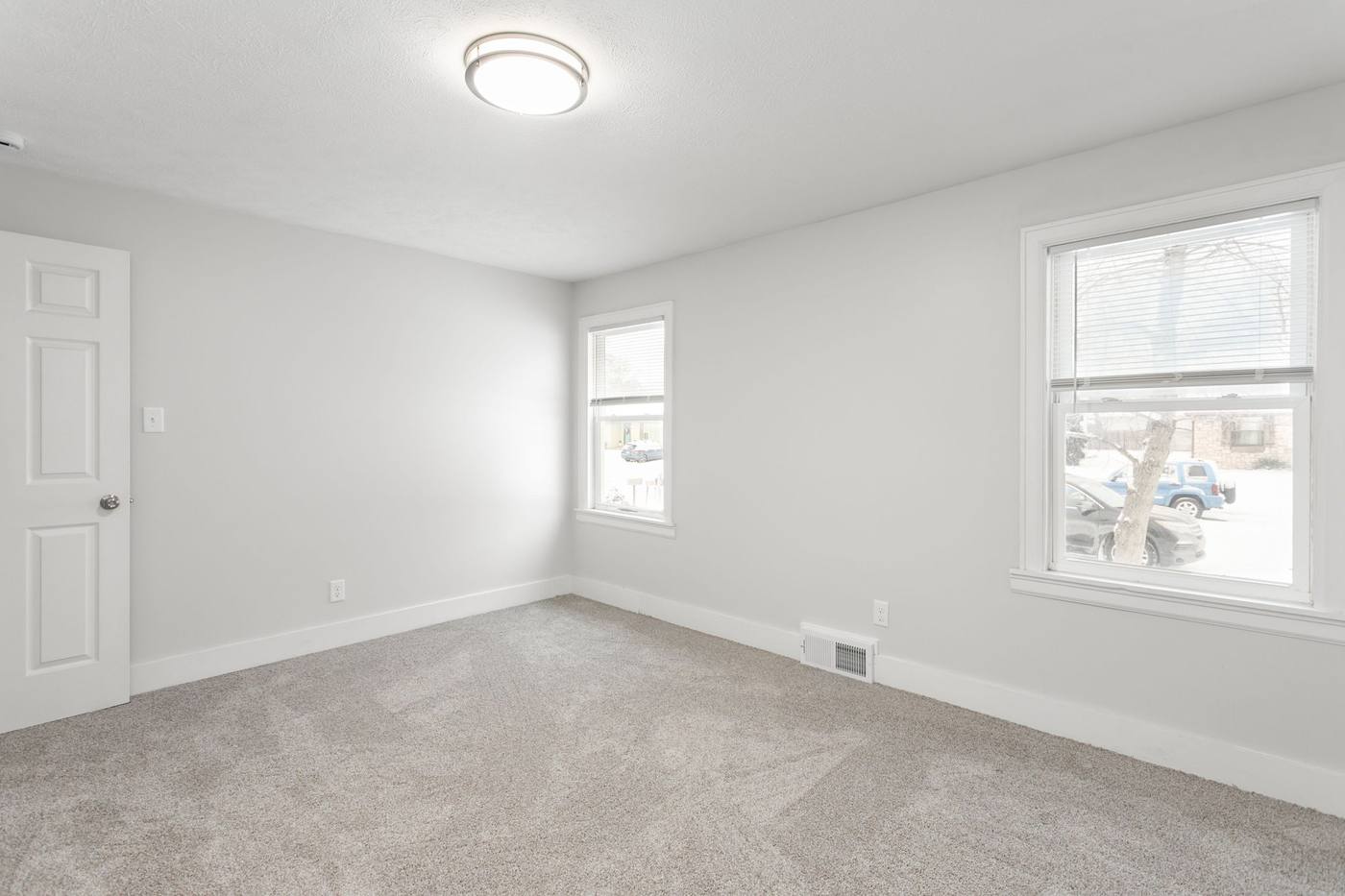 After: Renovated bedroom with new carpet — 705 E. Lowell Mishawaka