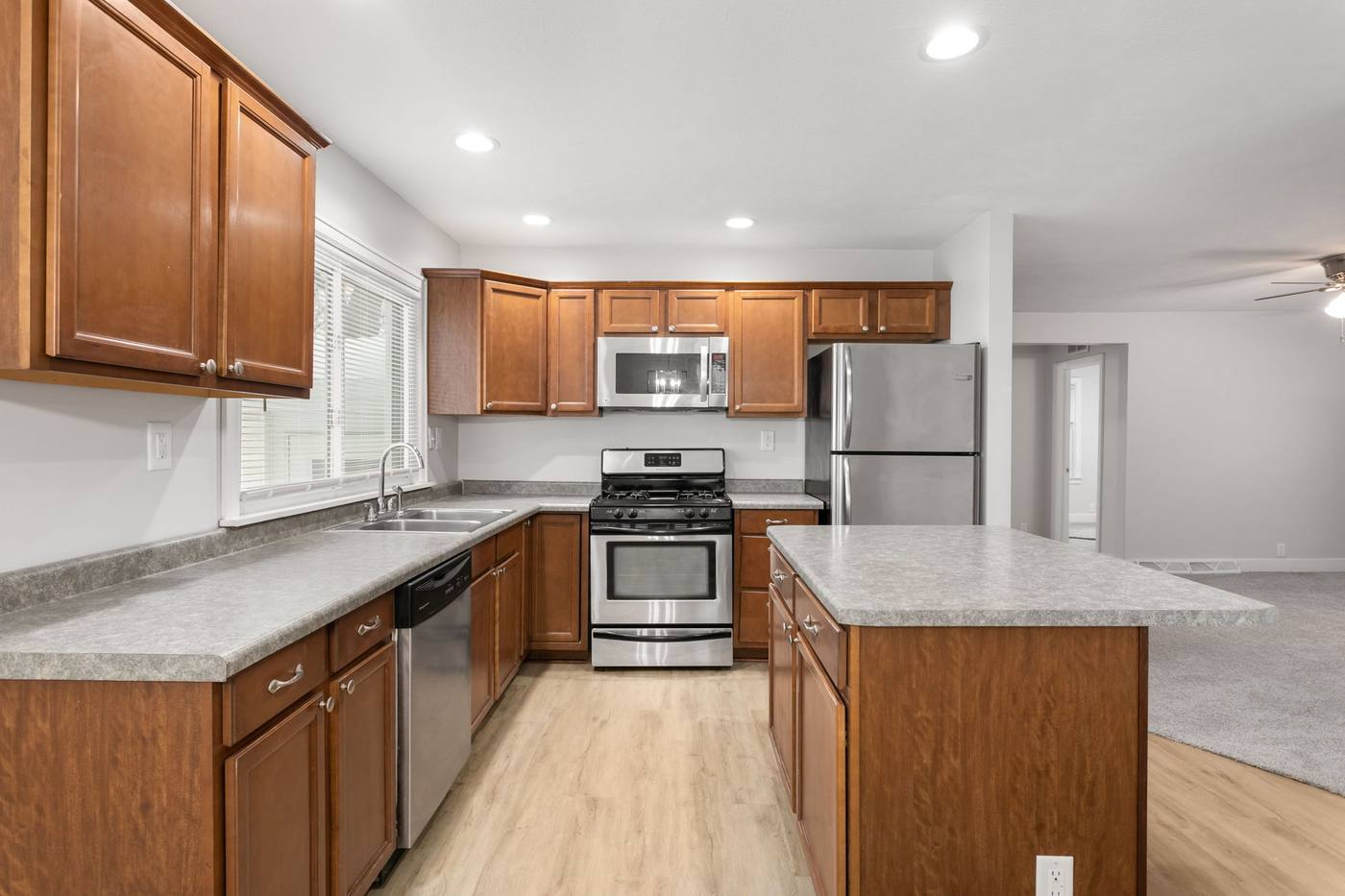 After: Renovated kitchen with new LVP flooring — 705 E. Lowell Mishawaka